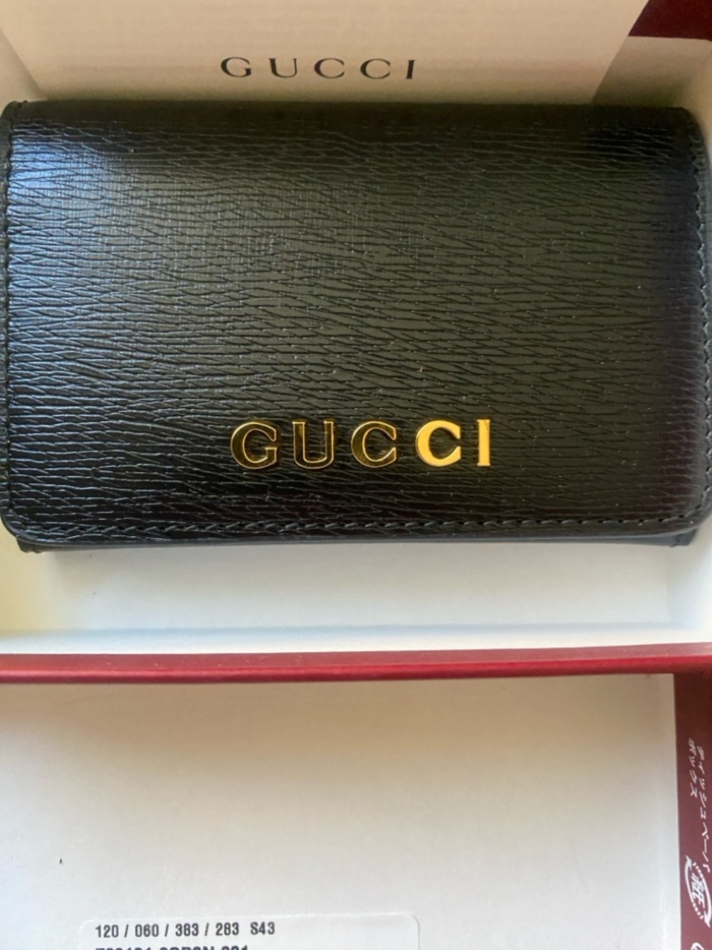 Gucci Black and White Printed Receipt Style Card
